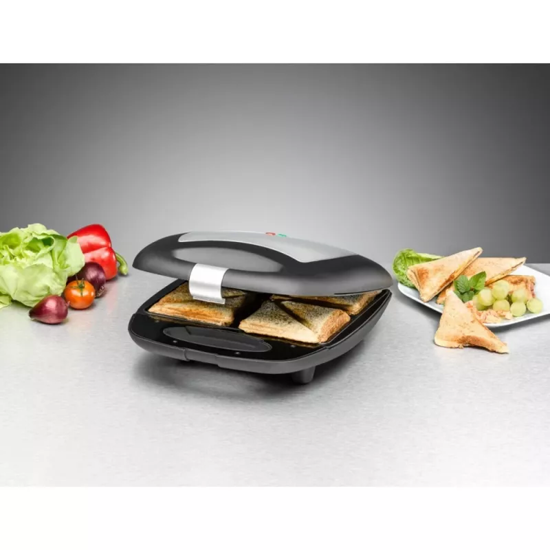 Sandwich maker Rommelsbacher ST 1410 — 4 sandwiches, 1400 W, non-stick plates, black/silver
