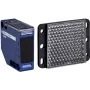 Photoelectric sensor APC XUK1ARCNL2H61 — blue plastic housing, 0–7 m range, 24–240 V AC input, 250 V output, 50×50×18 mm