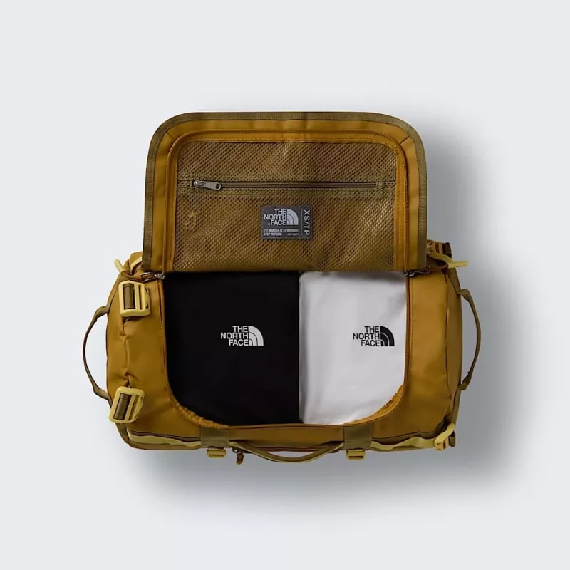Travel bag The North Face Base Camp Duffel XS - tan/cedar/honeye