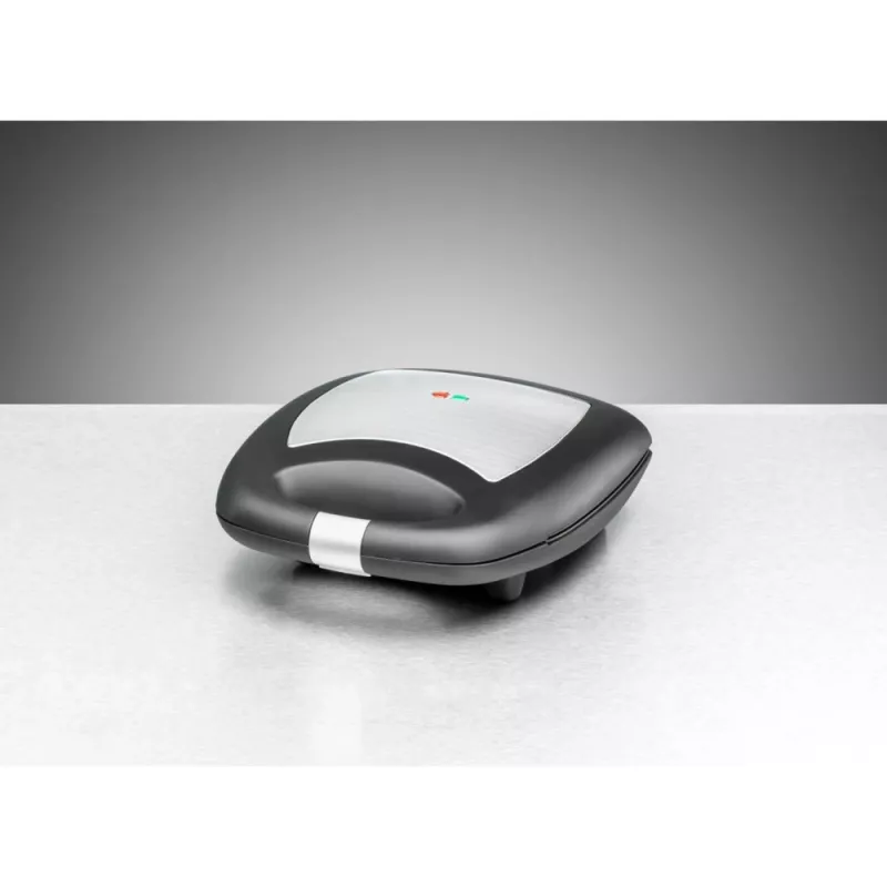 Sandwich maker Rommelsbacher ST 1410 — 4 sandwiches, 1400 W, non-stick plates, black/silver