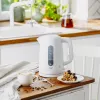 Electric kettle Adler AD 1379w — 1.7 L, up to 2200 W, white, 360° swivel base, polypropylene