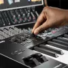 M-Audio Oxygen Pro 49 MIDI keyboard controller — 49 keys, 16 pads, 9 faders, OLED display, USB, MIDI out