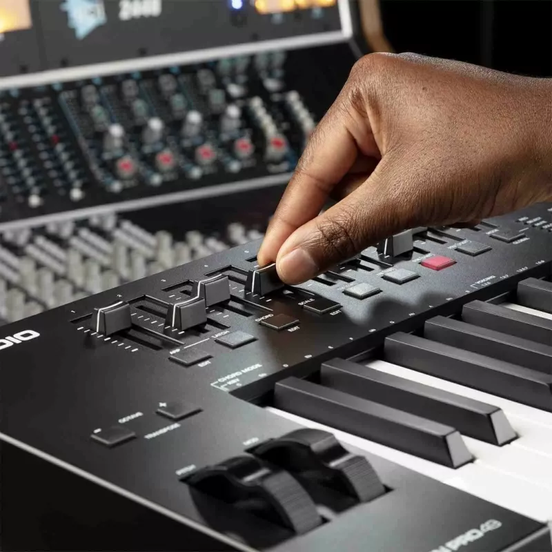 M-Audio Oxygen Pro 49 MIDI keyboard controller — 49 keys, 16 pads, 9 faders, OLED display, USB, MIDI out