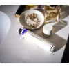 Therabody TheraFace Depuffing Wand facial hot and cold care device, white