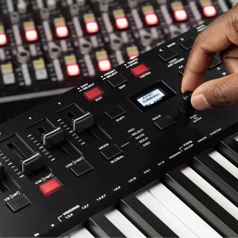 M-Audio Oxygen Pro 49 MIDI keyboard controller — 49 keys, 16 pads, 9 faders, OLED display, USB, MIDI out