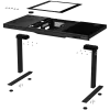 Dual-motor sit/stand adjustable-height gaming desk with built-in PC case, wireless charger, RGB lighting, control panel, and USB ports, tempered glass tabletop, black.