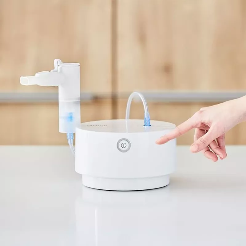 Tabletop nebulizer Omron C28P with 10 ml/min capacity, 2.65 µm particle size, white, dimensions 265×195×143 mm