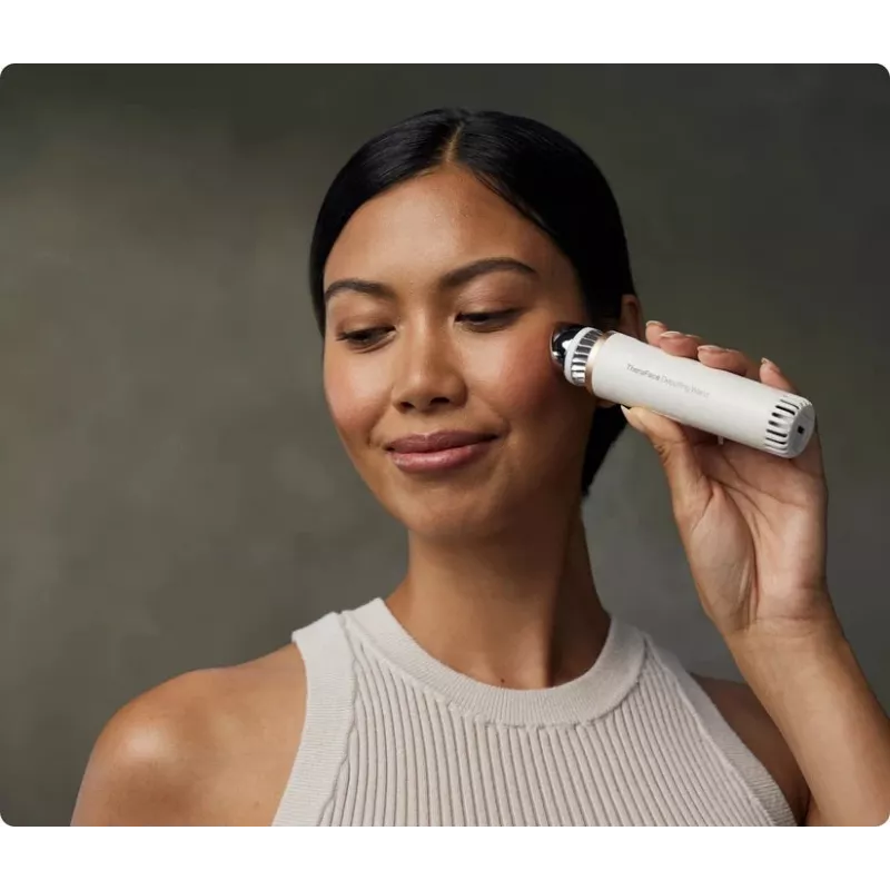 Therabody TheraFace Depuffing Wand facial hot and cold care device, white