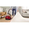 Vacuum cleaner Bosch BGB 41RD3H — 600 W, 4 L dust bag, HEPA filter, 11 m radius, telescopic tube, red