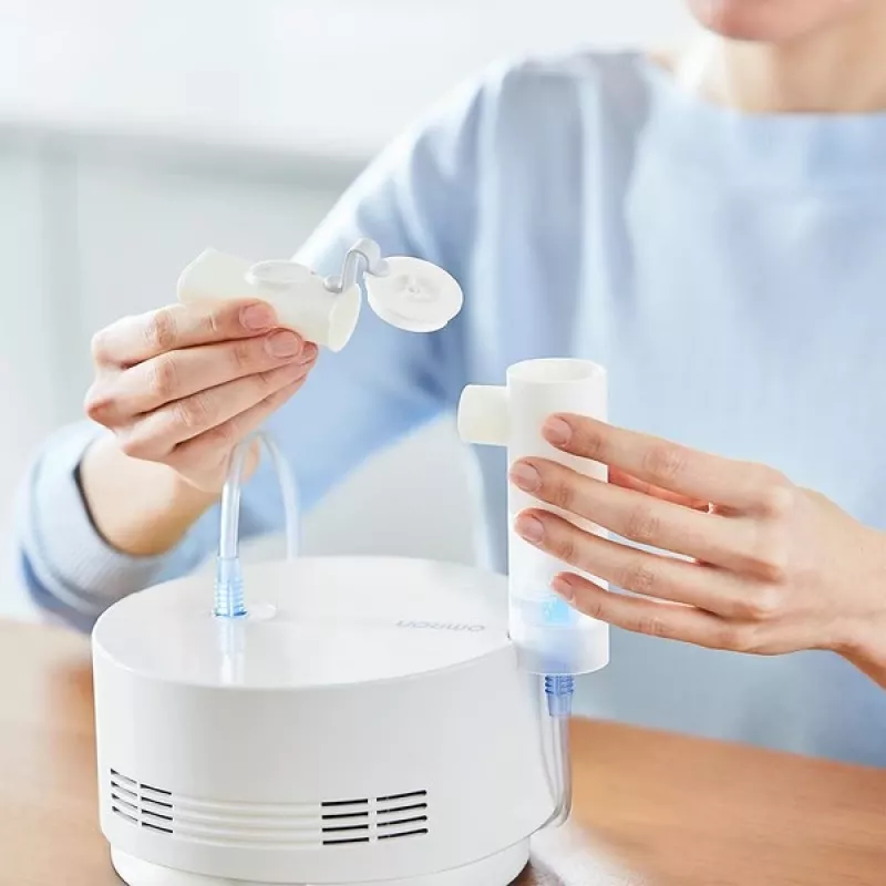 Tabletop nebulizer Omron C28P with 10 ml/min capacity, 2.65 µm particle size, white, dimensions 265×195×143 mm