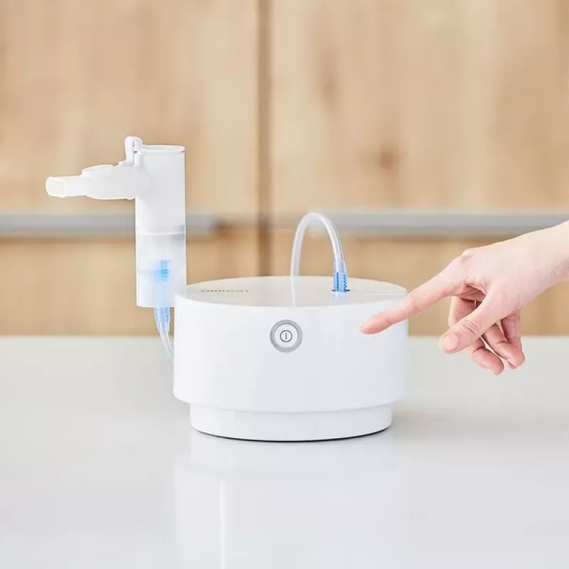 Tabletop nebulizer Omron C28P with 10 ml/min capacity, 2.65 µm particle size, white, dimensions 265×195×143 mm