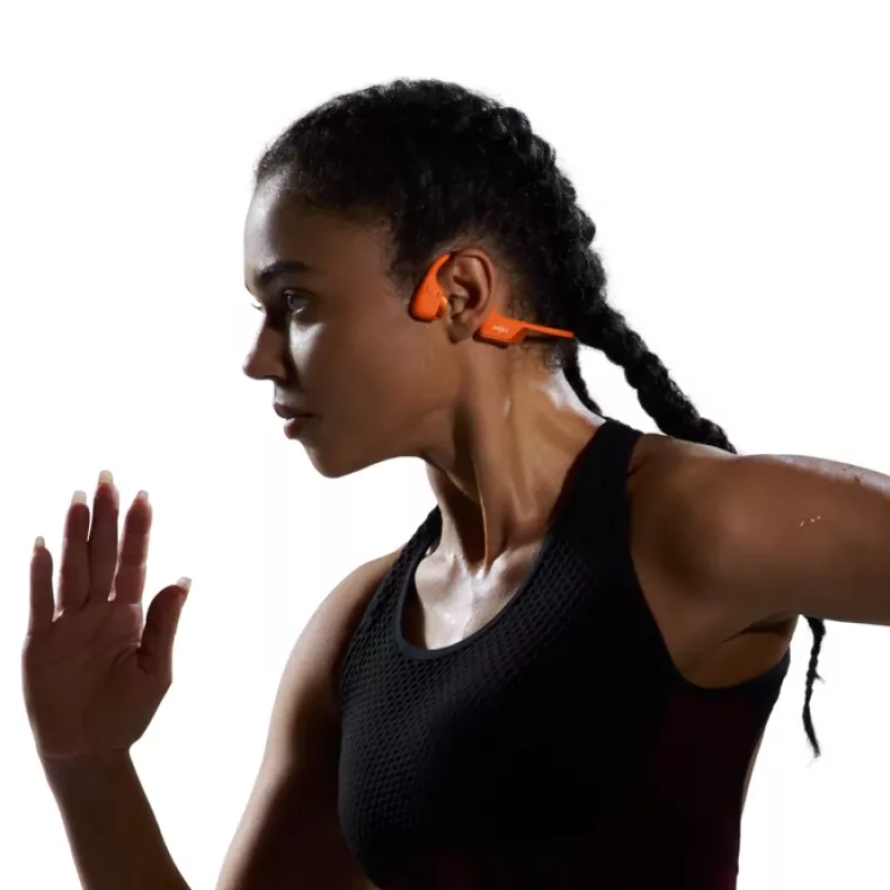 Bone conduction headset Shokz OpenRun Pro 2 — binaural, wireless Bluetooth 5.3, IP55, 12 h playtime, 150 mAh, orange, ear-hook