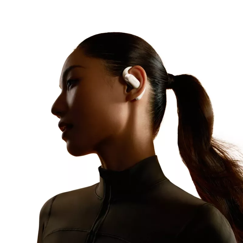 Open-ear wireless headset Shokz OpenFit 2 — Bluetooth 5.4, IP55, bone conduction, 11h playback (48h with case), USB‑C, beige