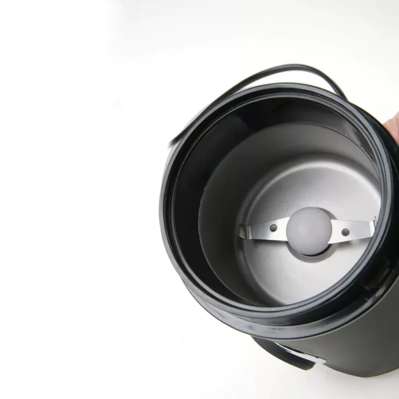 Coffee grinder Black & Decker BXCG150E — 150 W, 50 g capacity, stainless steel blades, button control