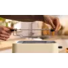 Toaster Bosch Compact TAT3M127 — 2-slot beige plastic housing, compact design