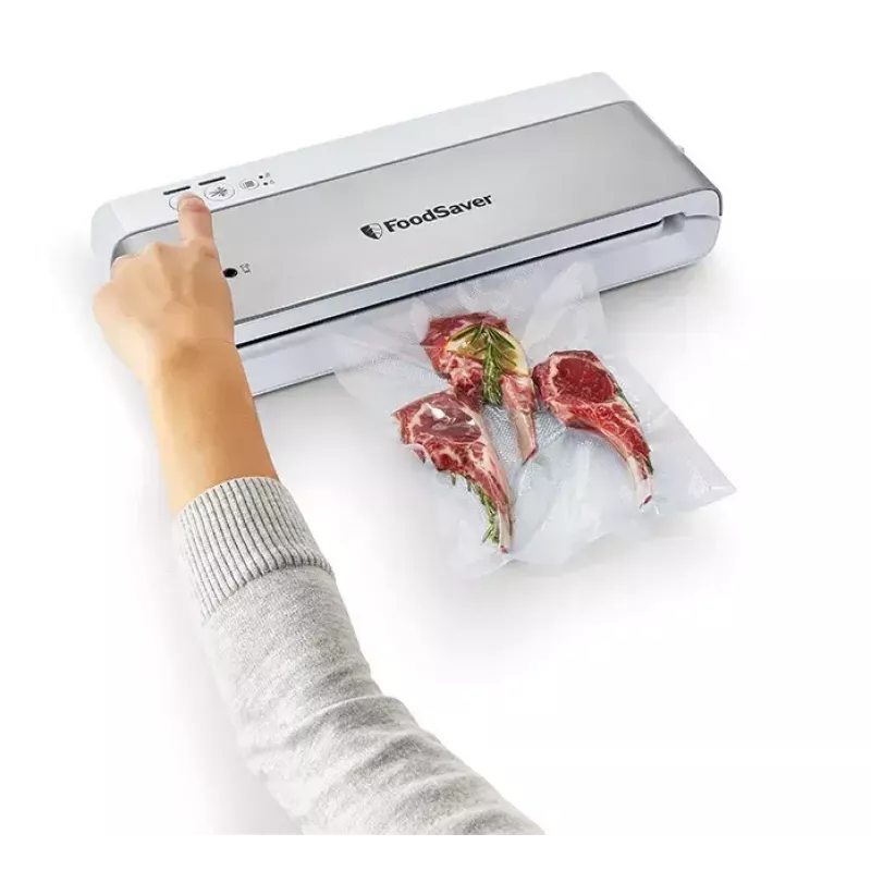 Vacuum sealer FoodSaver VS0100X — rotary control, includes roll and 4 vacuum bags, silver-white
