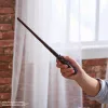 Wizarding World Harry Potter, 12-inch Magical Collector Harry Potter Wand with Stand & Die-cast Icon, Magical Creatures, Accessory for Costumes