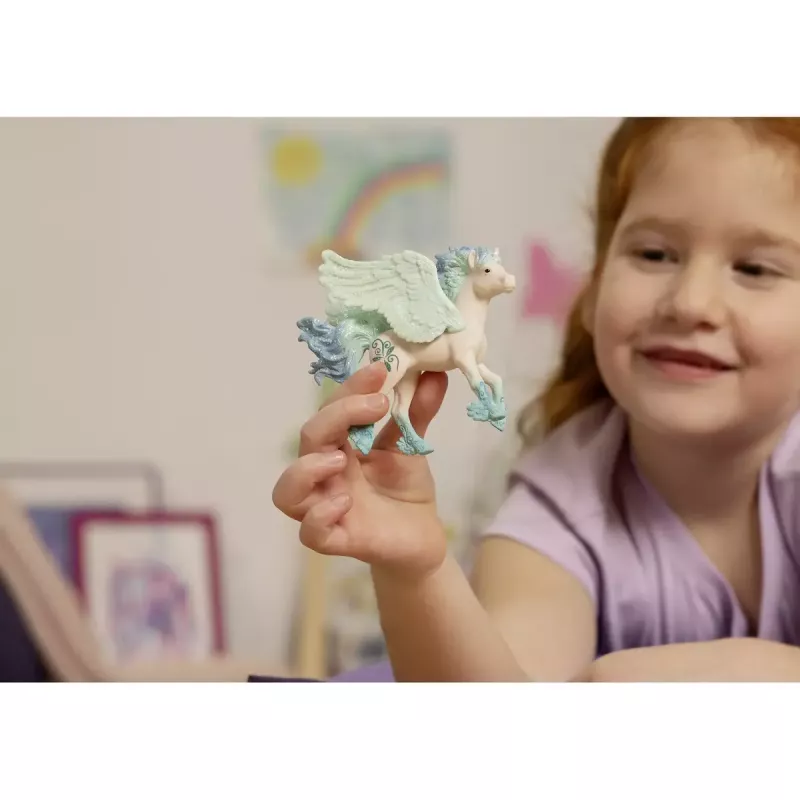 Schleich Stormy Unicorn Foal figure, BAYALA series, model 70824, for ages 5+, beige with blue and green details