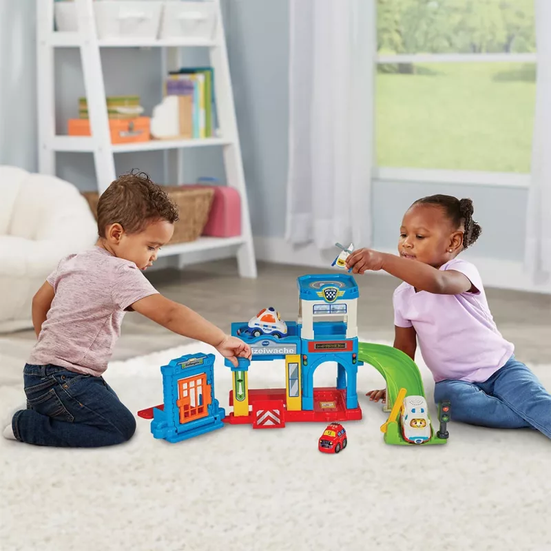 Toy playset VTech Tut Tut Baby Flitzer Police Station 80-569904 with interactive features and vehicles