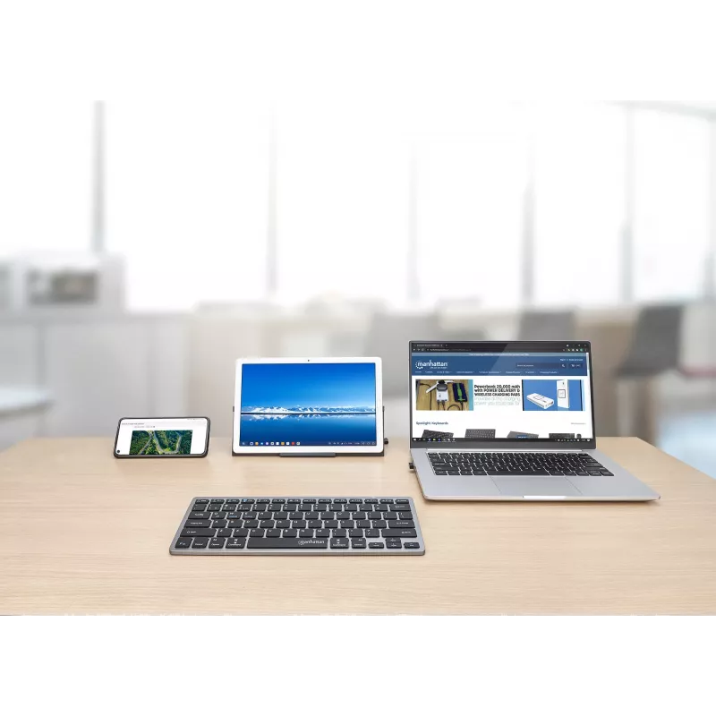 Manhattan Ultra Slim Dual-Mode Wireless Keyboard, German Quertz layout, Bluetooth (v3.0) and Wireless (2.4GHz), 78 low profile scissor keys, Auto Power Management, Range 10m, USB-A Micro Receiver, AAA Battery (included), Windows and Mac, Three Year Warranty