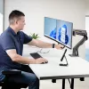StarTech.com Desk Mount Dual Monitor Arm with Crossbar, Up To 27 inch Displays, VESA 75x75/100x100, Max 33lb/15kg, C-Clamp, Fully Articulating, Mechanical Spring, TAA
