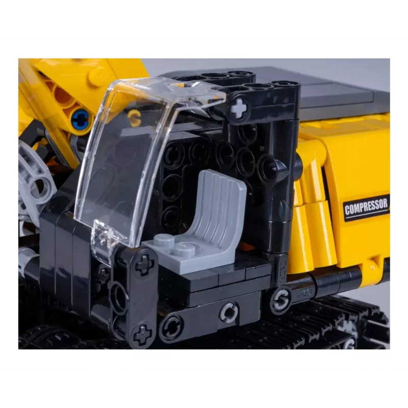 Excavator model Jamara CaDA Excavator Bricks, recommended age 8+, weight 0.36 kg, black/yellow