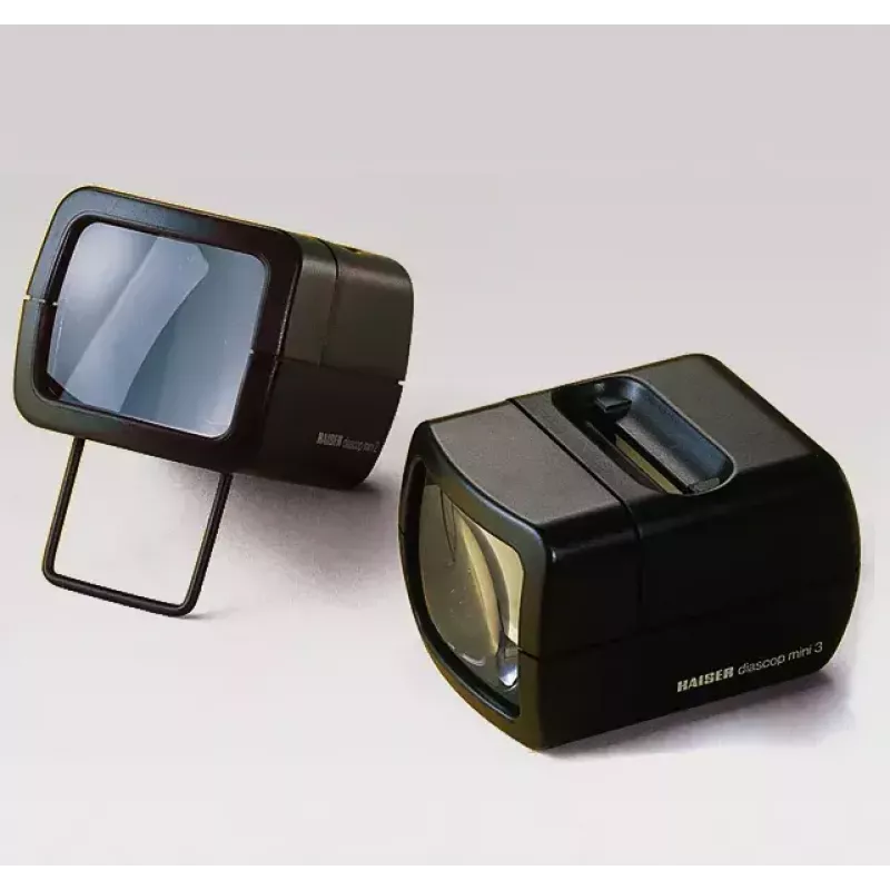 Slide projector KAISER 2010 — compact 3× magnification, 75×105×60 mm, 1.5 V battery