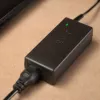 Laptop charger Akyga AK-ND-85, indoor AC adapter 100–250V input, 12V 5A output, 1.2m cable, black