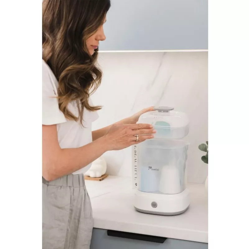 Momini Bottle Steriliser QuickSteam - Electric Steam Sterilizer for 6 Baby Bottles, 8-Minute Cycle, Automatic Shut-Off, BPA-Free