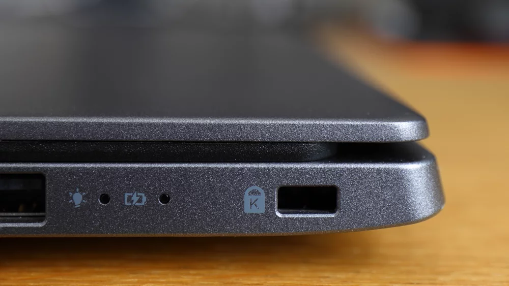 Kensington lock slot next to a USB port on the side of an Acer Swift 3 laptop