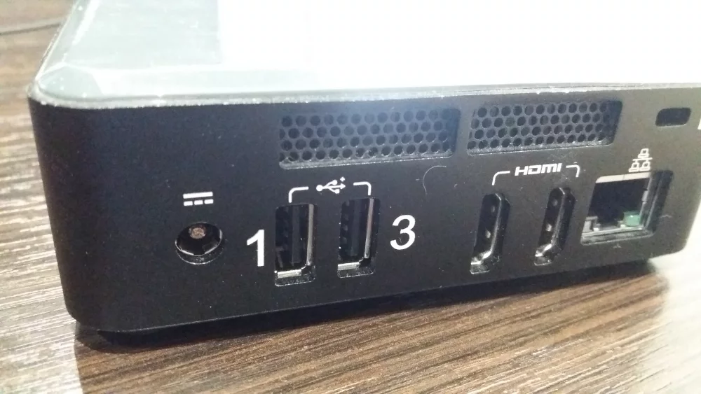 USB, HDMI and Ethernet connectors on the back of an Intel NUC mini PC