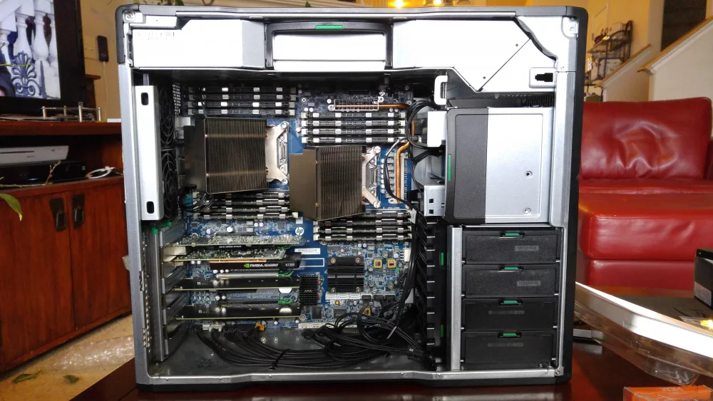 Open HP Z workstation tower showing memory slots and graphics cards