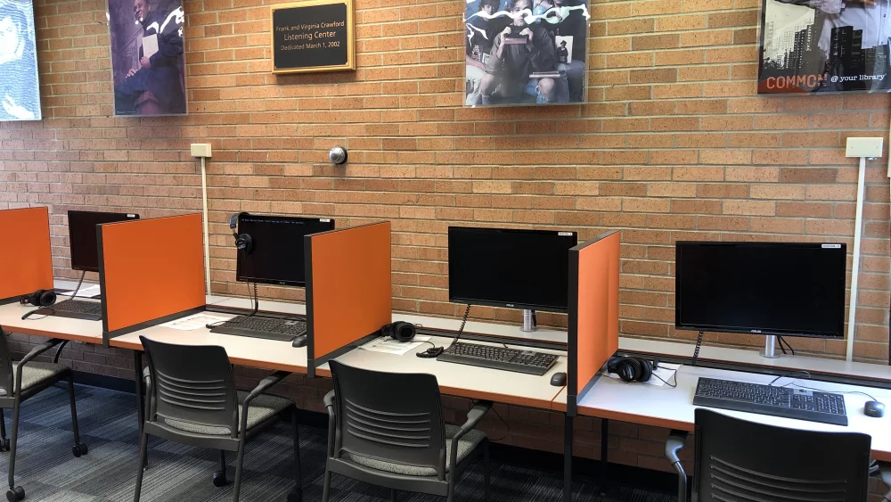 New desktop computer and laptop side by side on a desk
