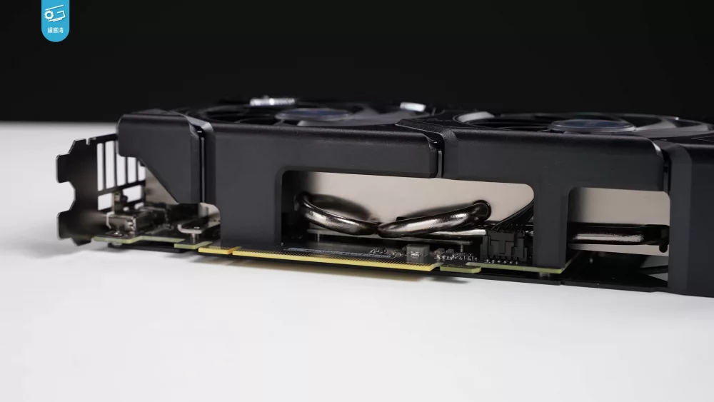 Dual fan graphics card on a white desk