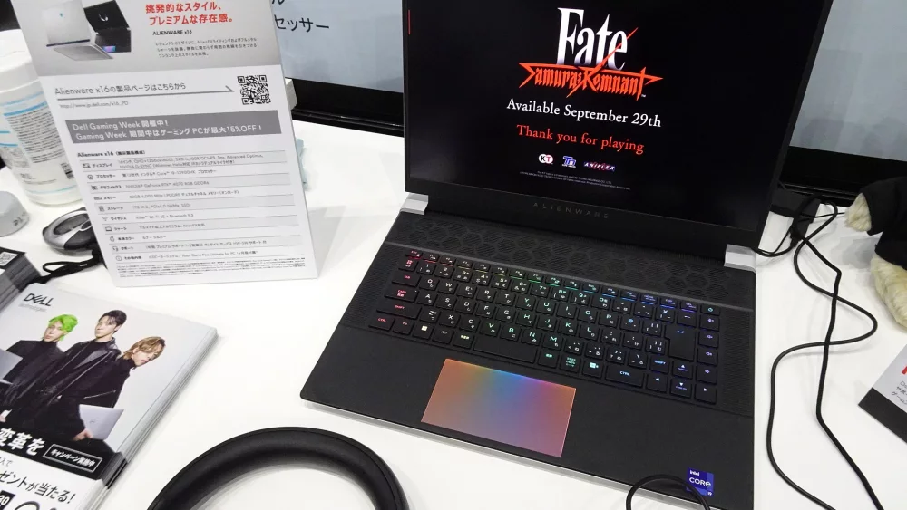 Laptops on display with product information cards